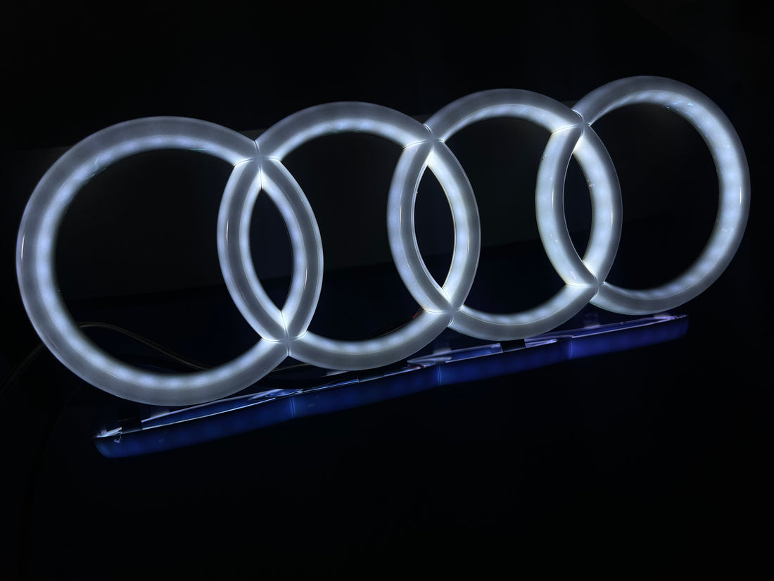 AUDI WHITE GLO EMBLEM